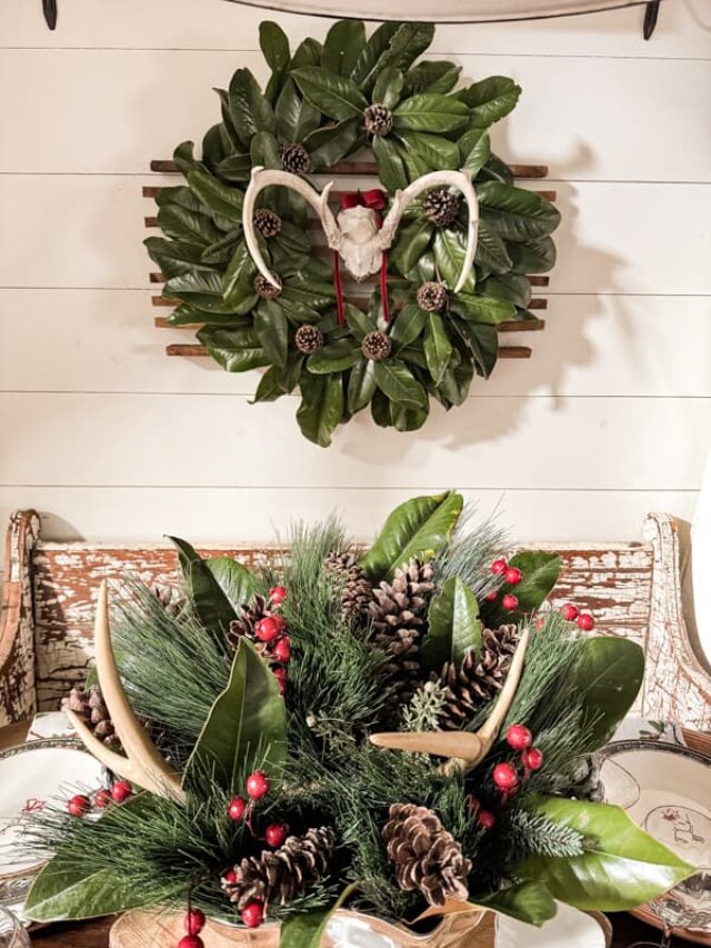DIY Magnolia and Pinecone wreath with Deer Antlers and Antler Centerpiece for a rustic farmhouse look.