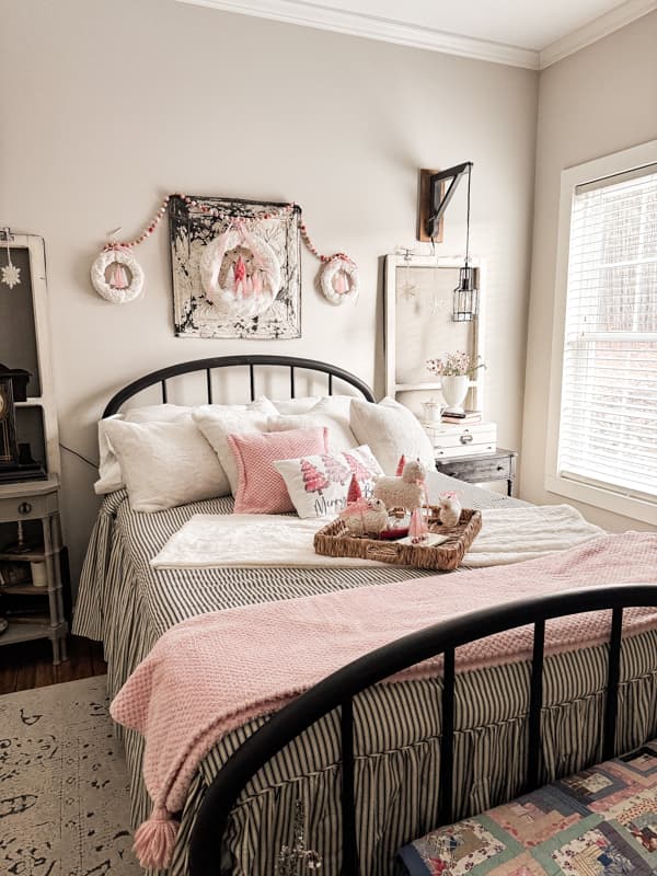 Pink country bedroom Christmas with cheap decorations. Bottle brush wreath.