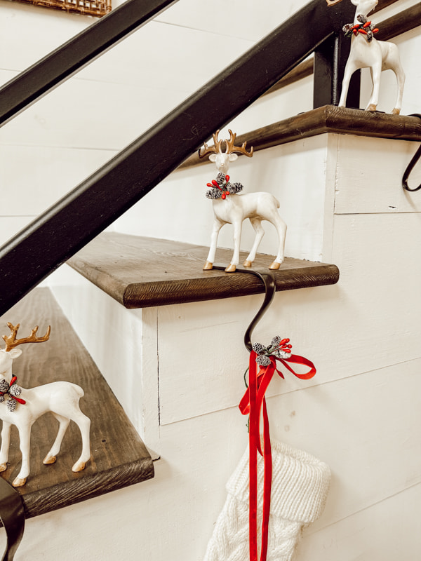 Create Amazing Christmas Reindeer with Budget Dollar Tree items with a rustic upgrade for Christmas Stocking Holders on Staircase.