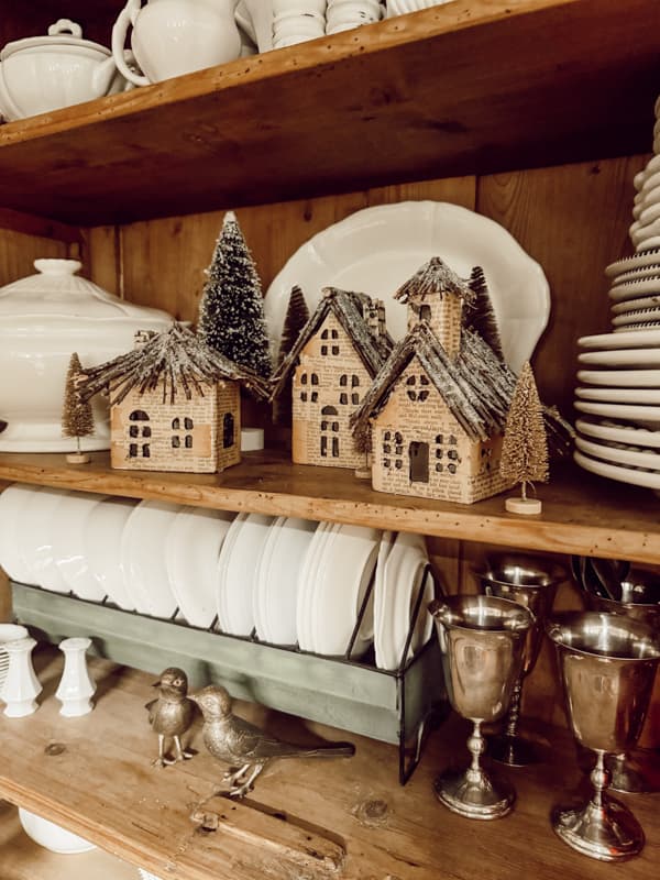DIY Christmas Village Settings for a rustic upcycled Holiday Decoration in a dining room cabinets