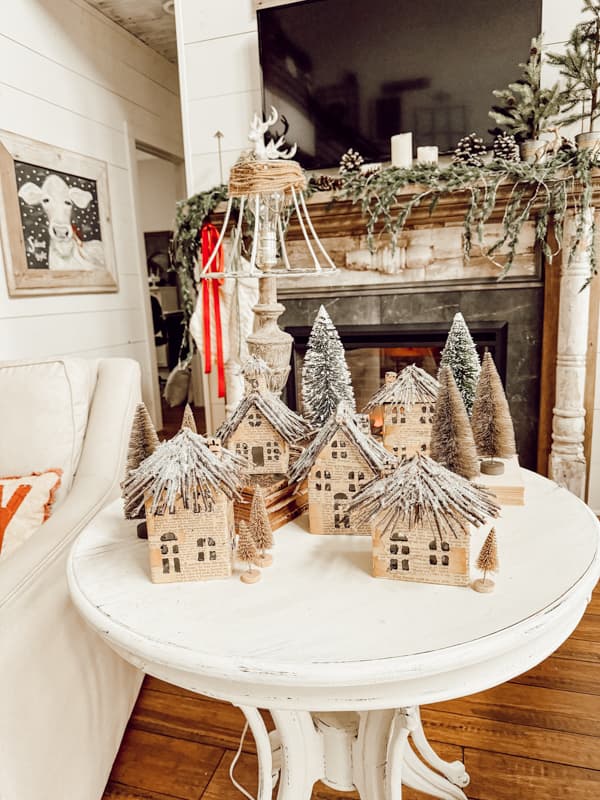 Upcycled Old Book Pages for a Rustic DIY Christmas Village Display Setting. Old Christmas decor transformation. 