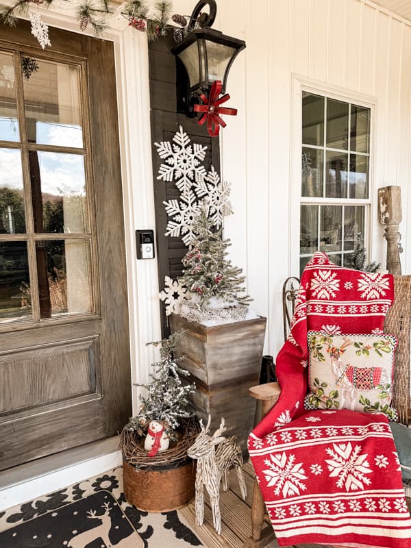 Winter Wonderland Decorations for a cozy country Christmas porch.  Farmhouse style decorating.  