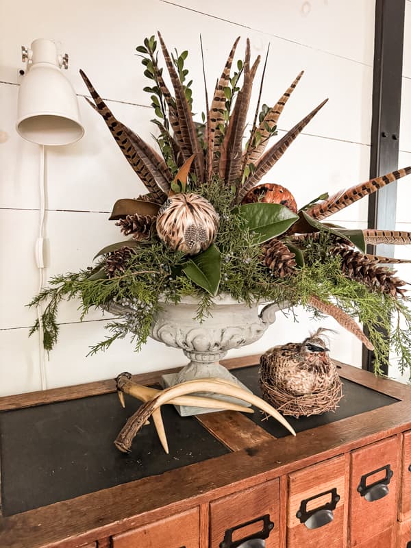 Greenery Centerpiece with cedar, magnolia leaves and boxwood stems for a unique rustic Christmas Centerpiece