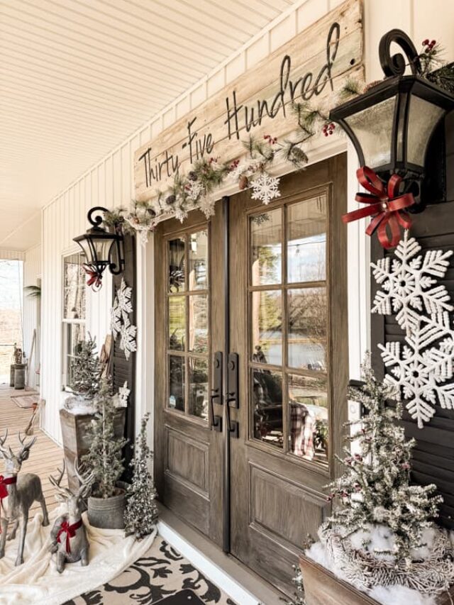 Cozy Country Front Porch with french doors and DIY address sign decorated for Christmas with snowflakes.