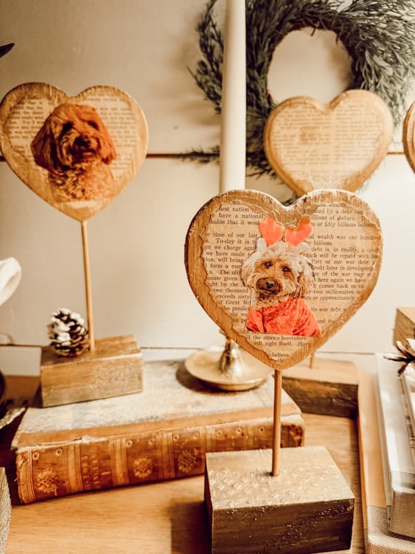 Personalized Dollar Tree Wood Hearts with pet images on old book pages for a Valentine's Day Decoration