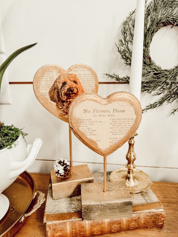 DIY Dollar Tree Valentine's Day Hearts. Hearts sitting on vintage books.