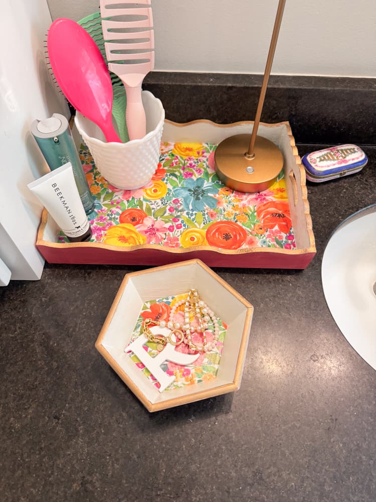 Hobby Lobby Wood bowl and Dollar Tree Tray transformed into a Anthropologie Dupe Monogranned trinket tray. 