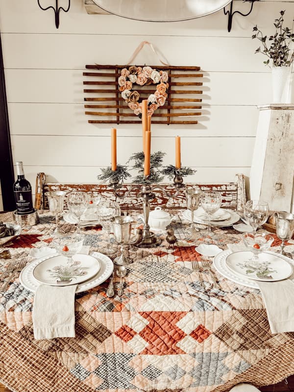 Inexpensive Dollar Tree Wreath with Paper Flowers for Valentine's Day Decorations around the cozy hygge dining table.