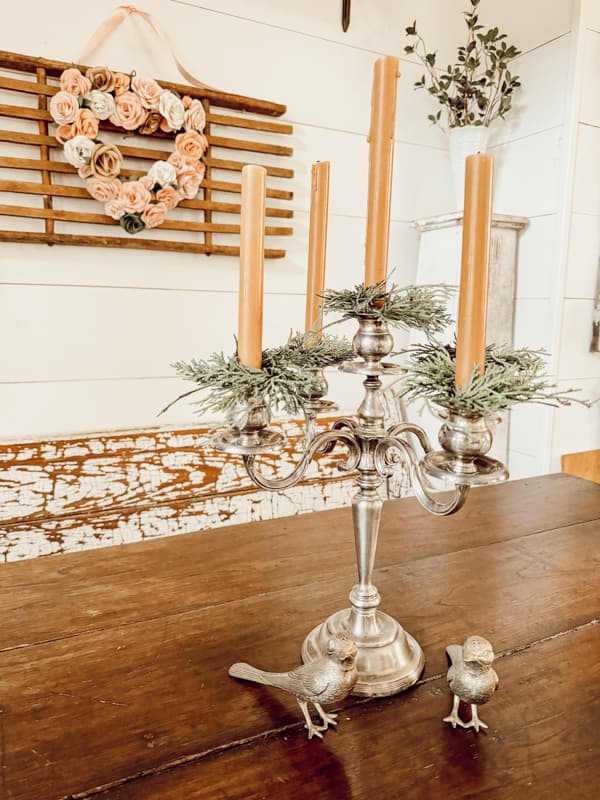 Simple vintage styling with a vintage candelabra on an antique farm table of solid walnut.
