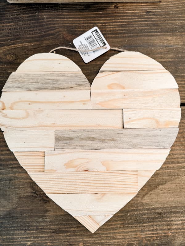 Farmhouse Valentines Decor with wood heart to cozy up your front door.  