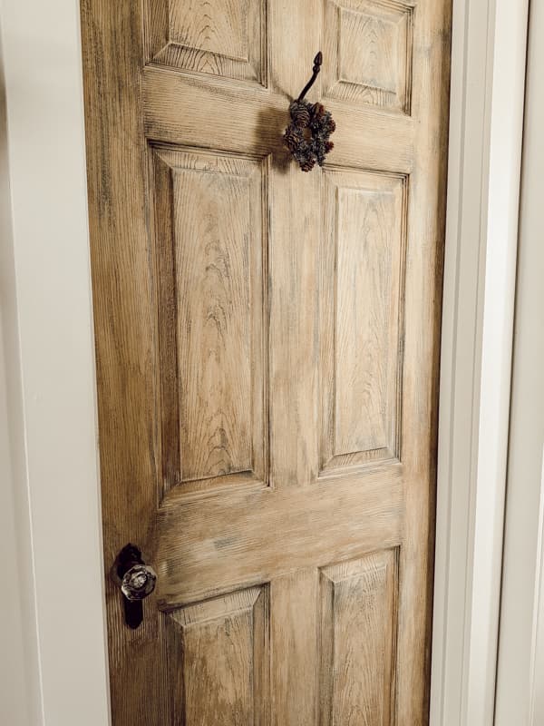 New Door with faux finish and antique door hardware in modern farmhouse.  Cottagecore style decorating.