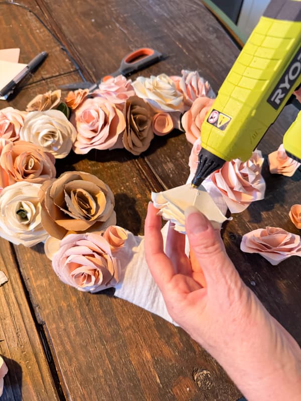 Add DIY paper roses to the Dollar Tree Wreath Frame for Valentine Wreath. A cottagecore craft.