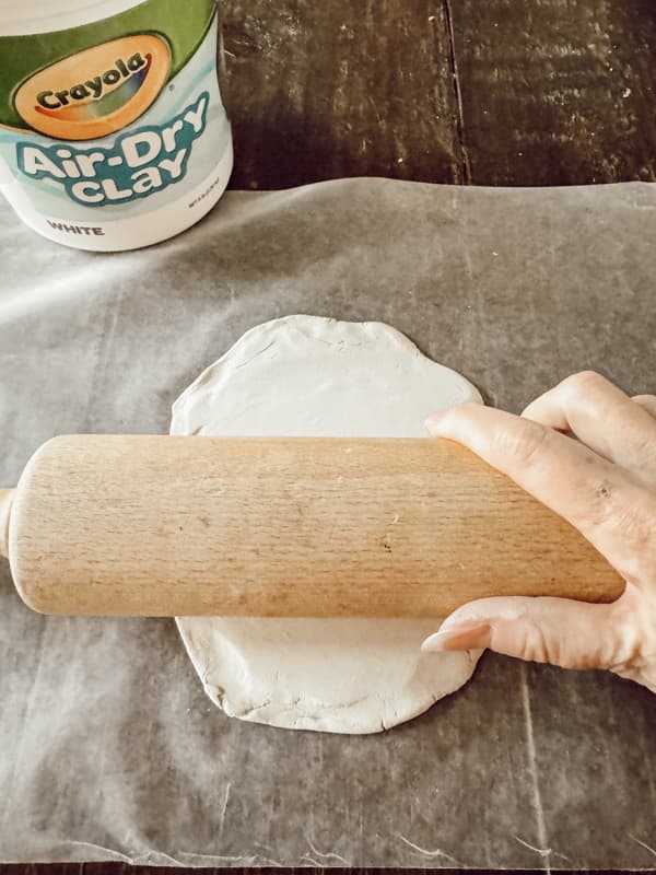 roll air dry clay with rolling pin.  