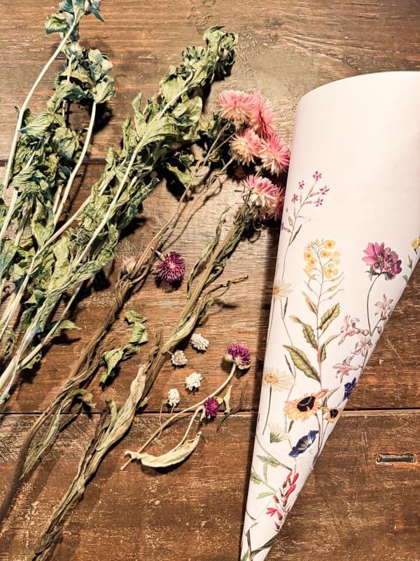 Dried flowers and decorative paper cone for DIY Valentine's Gift.
