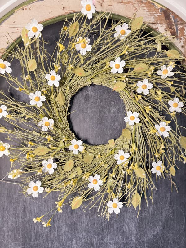 Spring Wreath - Anthropologie Dupe DIY wreath.  Rustic White Flowers and green leaves on recycled wreath frame