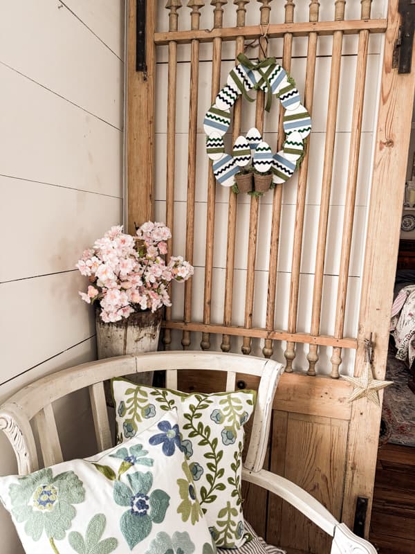 Painted Ribbon Blue and Green Easter Egg Wreath on Old Barn Door