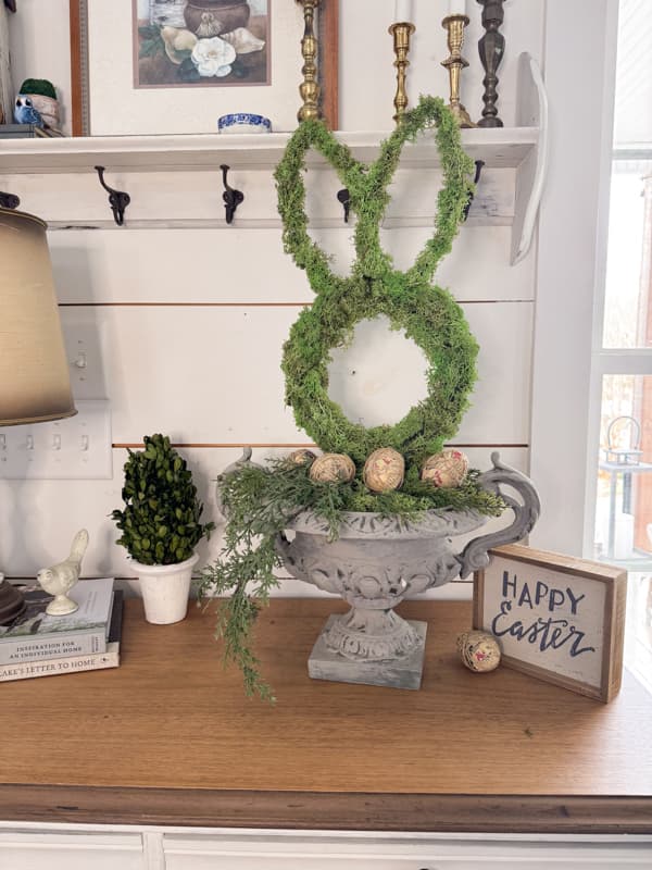Easy Moss Easter Rabbit Topiary with DIY Old Book Page Easter Eggs made with Dollar Tree Craft Supplies.