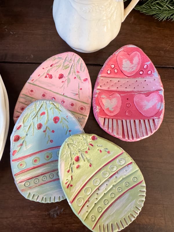 Colorful Easter Egg Craft Bowls with air-dry clay for a Pottery Barn Dupe.  Trinket Trays for a rustic Easter Decoration.