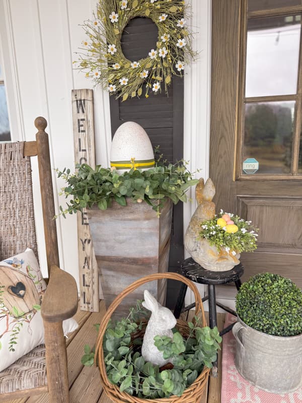 DIY Porch decor with Metal Wreath, Oversized Easter Eggs and DIY galvanized planter. DIY Easter Decorations for outside.