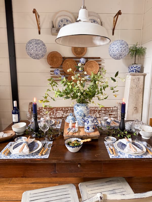 Chinoiserie Tablescape with Blue and White dishes, and tableware accessories.  