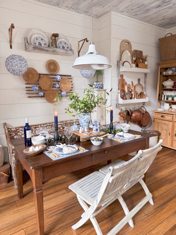 Chinoiserie Tablescape with Chinese lanterns, woven baskets, and Blue and White table decor.  