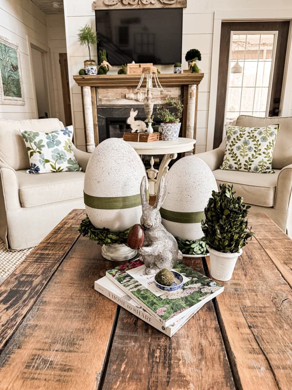 Use Dollar Tree Oversized Easter Eggs to create Farmhouse Speckled Eggs for Coffee Table Centerpiece with pewter bunny.
