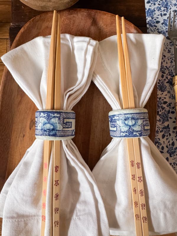  DIY Thrift Store Napkin Rings Transformed into boutique worthy stylish blue and white napkin rings