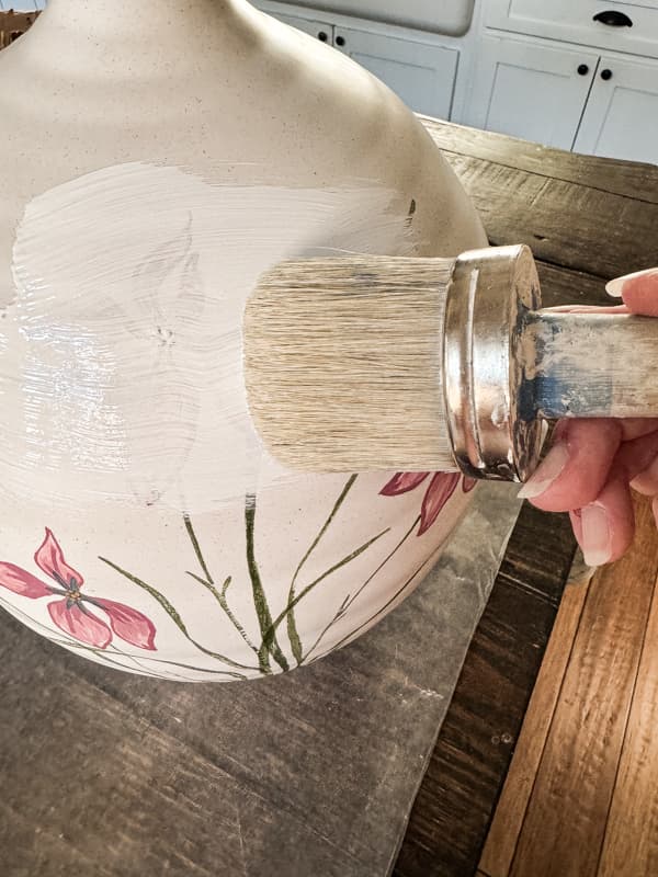 Paint the thrift store lamp with chalk paint first.  