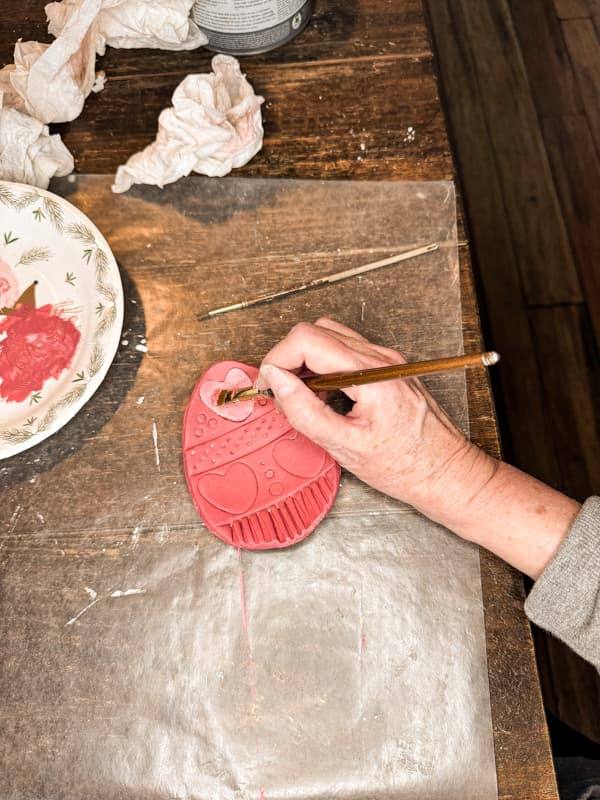 Paint the clay eggs with your choice of colors.  