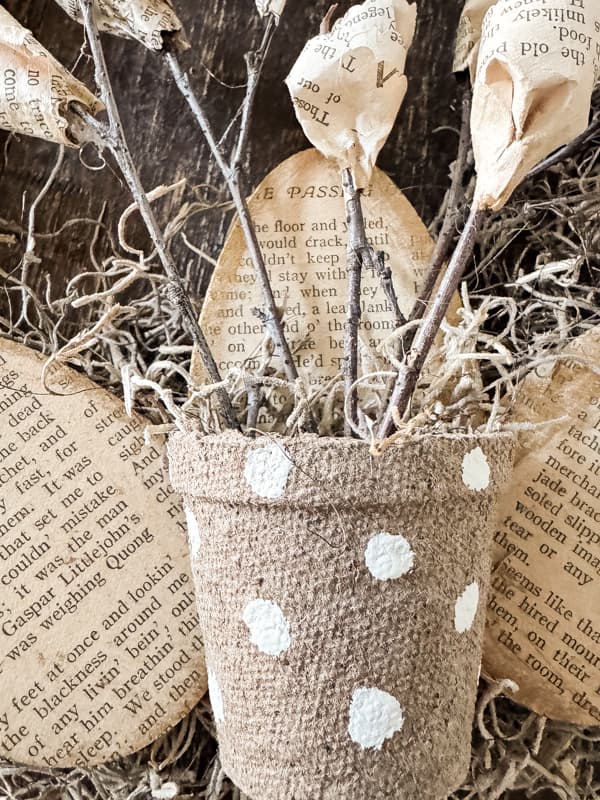 Polka Dot Seed Pot with DIY Old Book Page Flowers on Rustic Wreath.