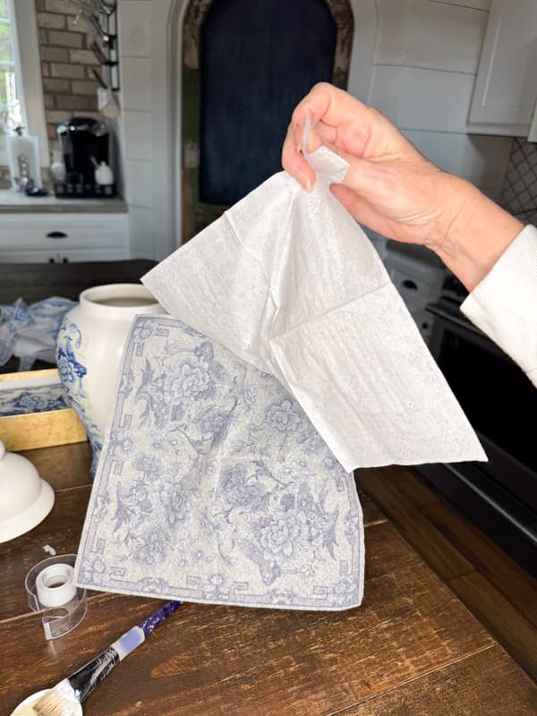 Separate the paper napkin layers for napkin decoupage