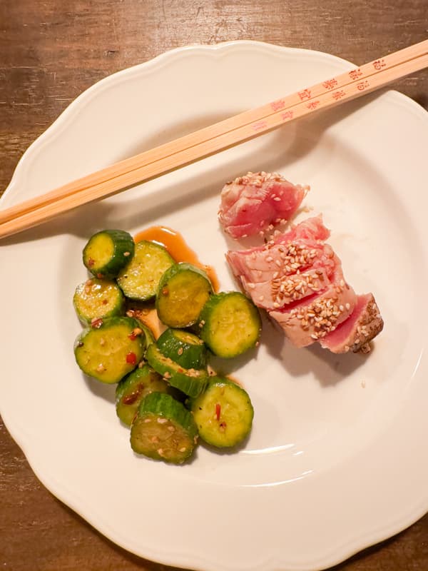 Chinese Pickled Cucumbers made with Pantry Staple Ingredients.  Crunchy side dish with seared tuna. 
