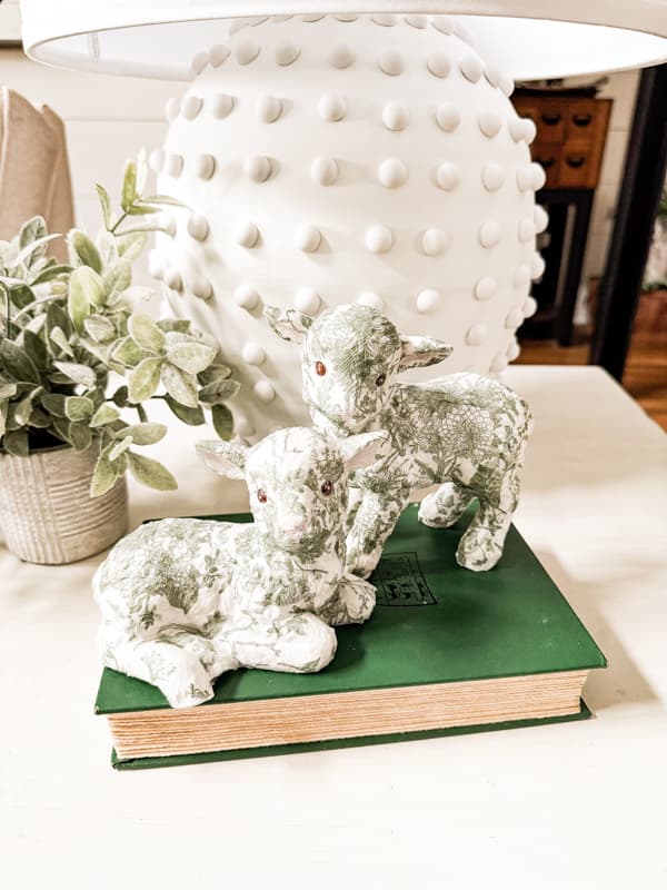 DIY Easter Lambs with green and white paper napkin decoupage on side table with DIY hobnail lamp.  