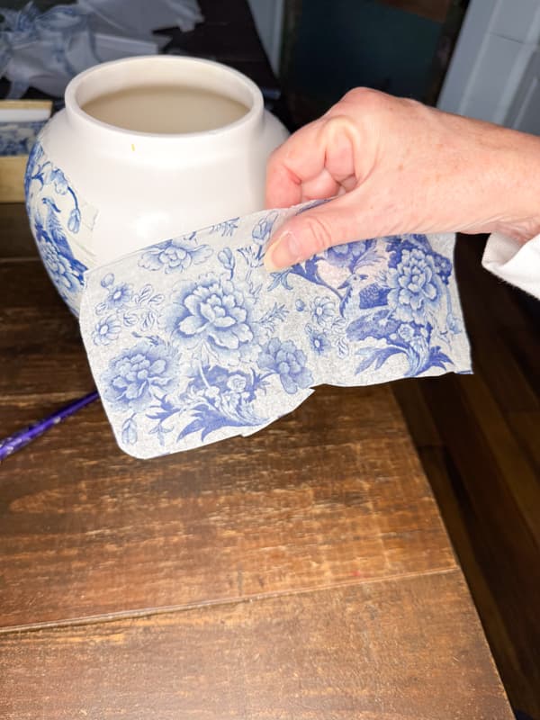Cut the Chinoiserie Blue and White napkins to fit on the ginger jar vase makeover.  