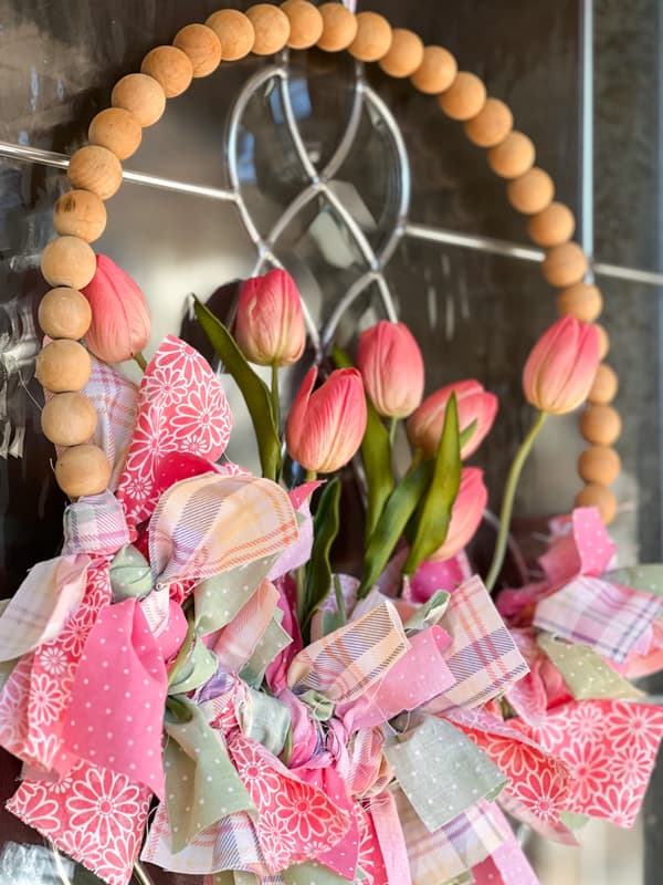 repurposed beaded Spring and Summer wreath with scrap fabric and tulips.