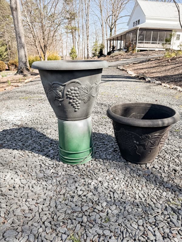 Make the resin planters look like cement planters with textured spray paint. 