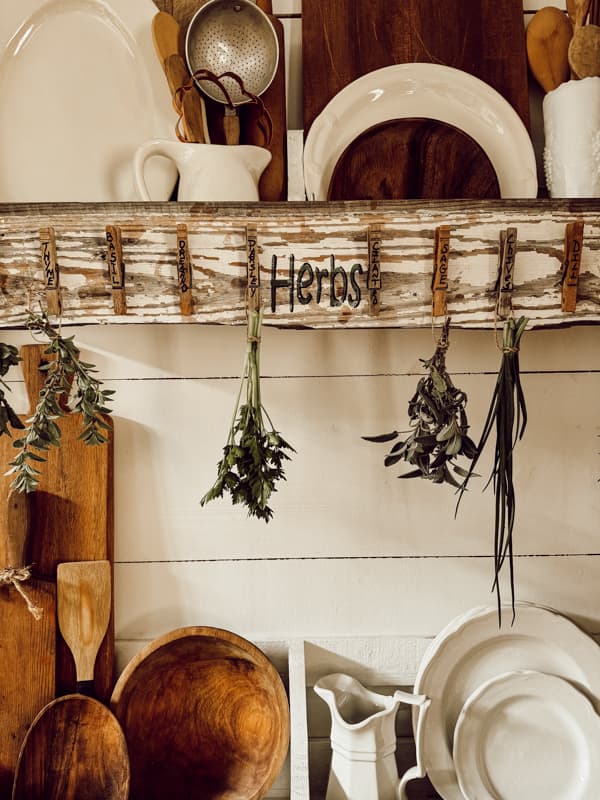 DIY Herb  or flower Drying Rack made with reclaimed shiplap and vintage clothespins.  