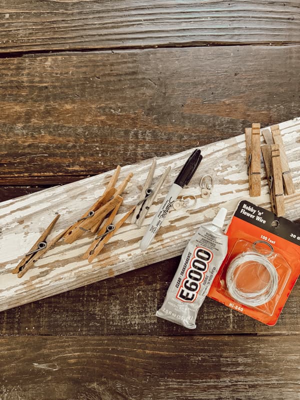 Reclaimed wood and clothespins supplies for DIY project
