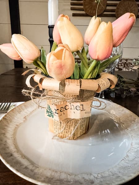 Personalize each flower pot with name.Use flower pot craft for place card on dining table plate for guest gifts.  