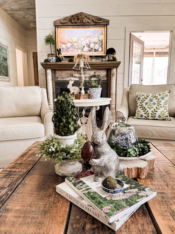 Easter Centerpiece on Farmhouse Coffee Table for Becorating on a Budget with Vintage Decorating