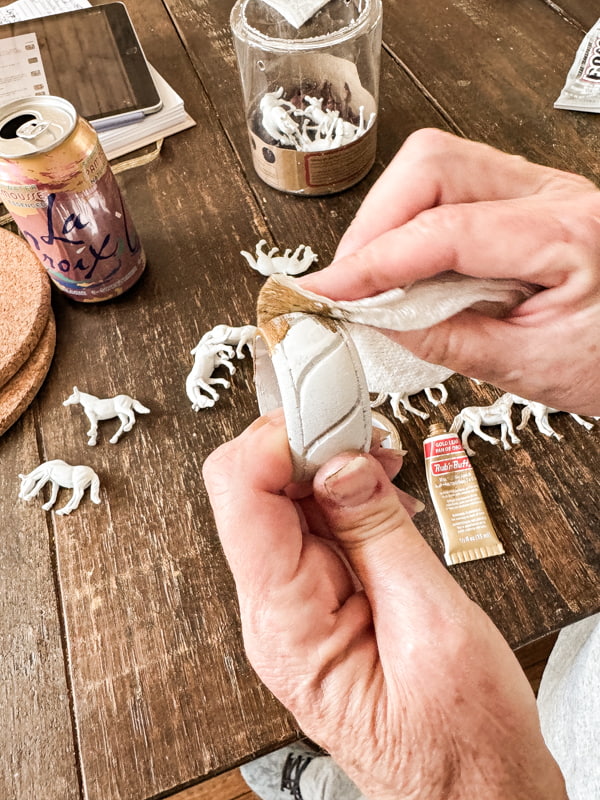 Use rub N Buff on thrift store napkin rings to enhance details.  