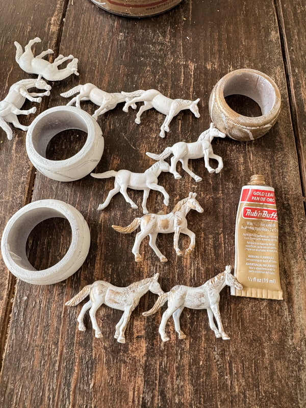 DIY Kentucky Derby Decorations: Fun Horse Napkin Rings made with thrift store wood napkin rings and rub n buff.