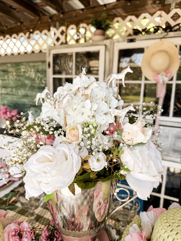 DIY mini-horse picks in the Kentucky Derby tablescape centerpiece.