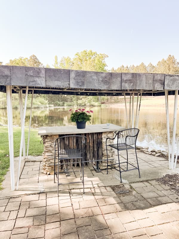 DIY Outdoor Kitchen Bar with DIY concrete Countertop and reclaimed slate roofing shingles.  