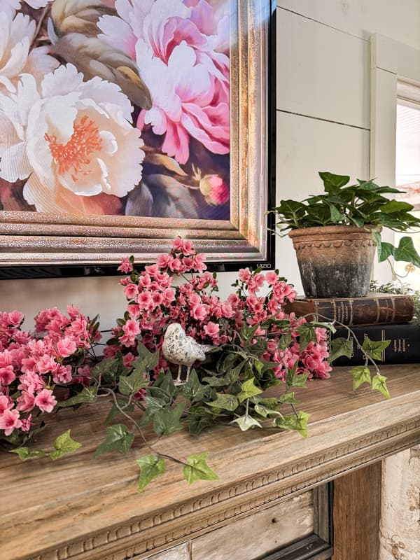 Pink azaleas and white bird on shabby chic Spring Mantel.  Elegant Springtime Mantel Decor