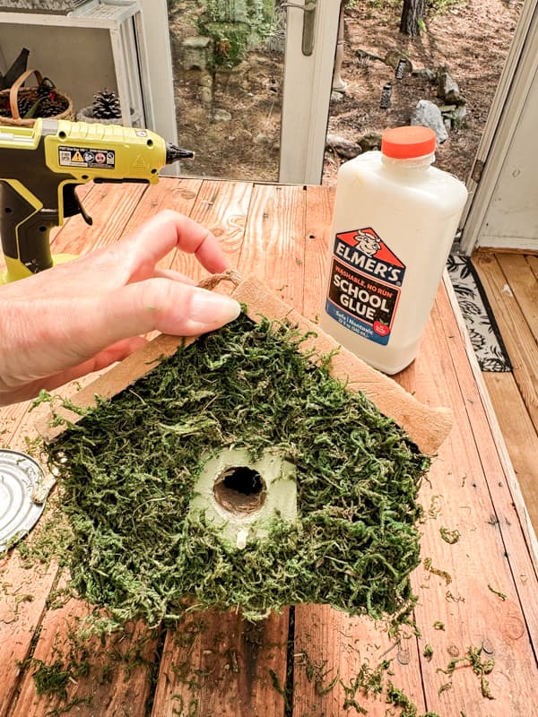 Cover the sides of the Vintage Birdhouse with moss