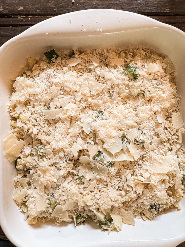 Add layer of parmesan Cheese to the top of the layered Oyster Corn Casserole.  