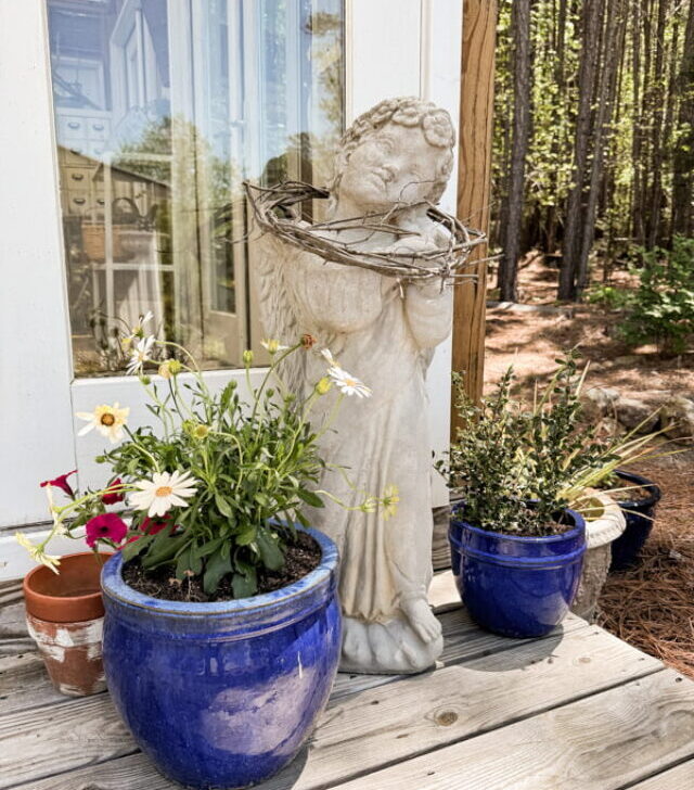 cropped-Angel-with-grapevine-at-Greenhouse-Concrete-Garden-Statues.jpg