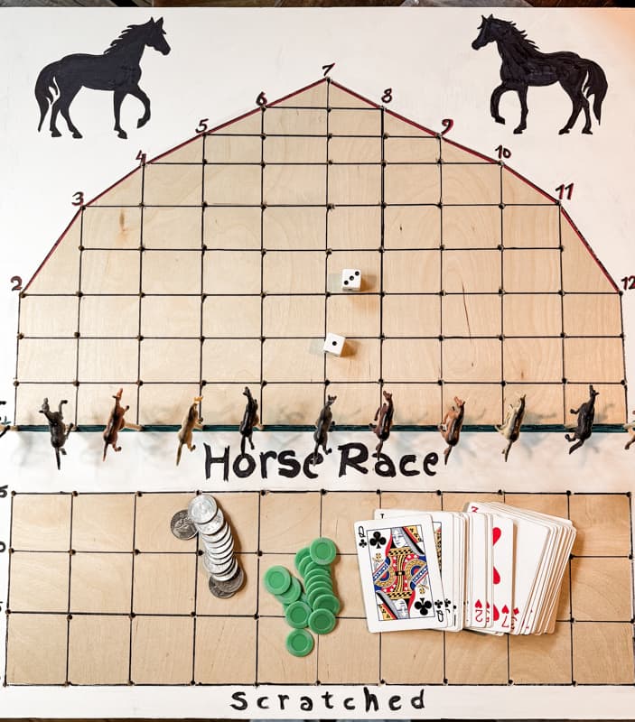 DIY Horse Race Game made from plywood, golf tees, playing cards, dice and chips. Derby Horse Race Game.