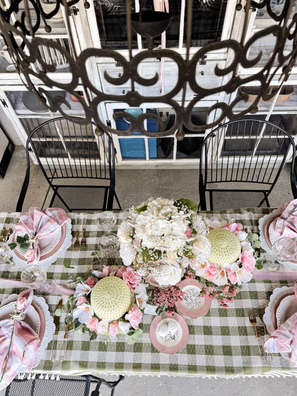 Derby Party Table Centerpiece with roses and hydrangeas and Dollar Tree Hats with roses.  